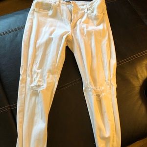 Size 32 distressed white jeans.